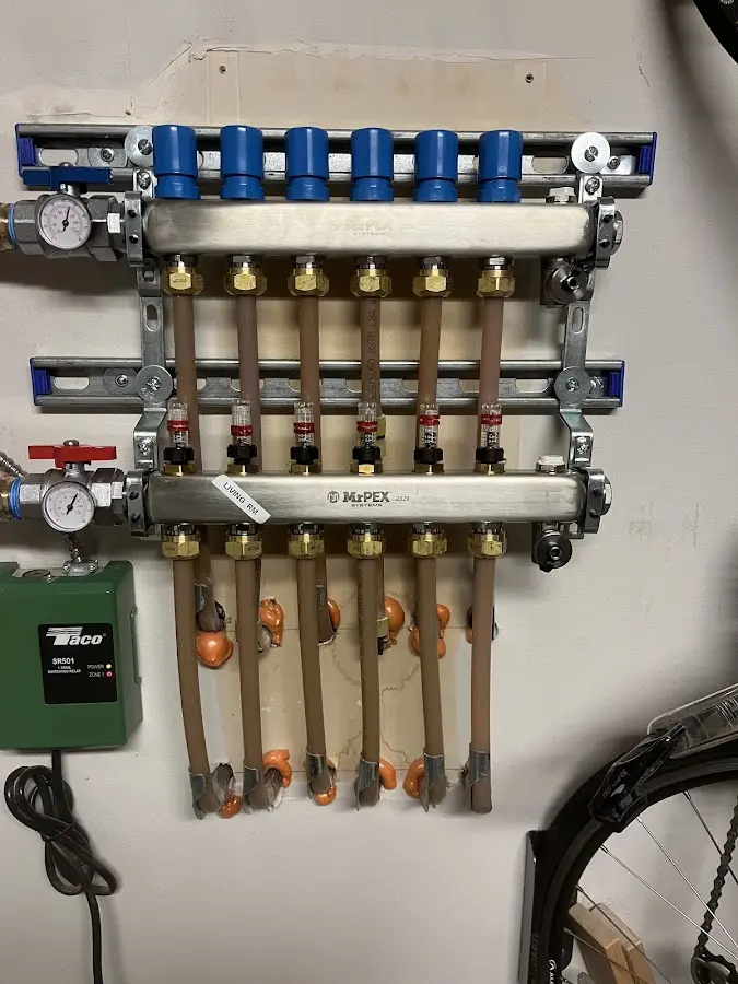 Plumber performing Water Heater Repair at a residential property in Grandview